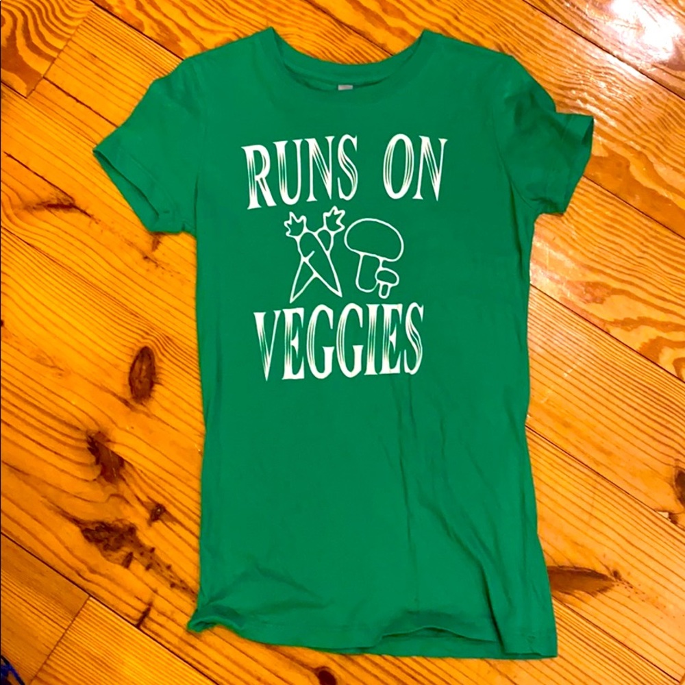 Small green shirt “runs on veggies”